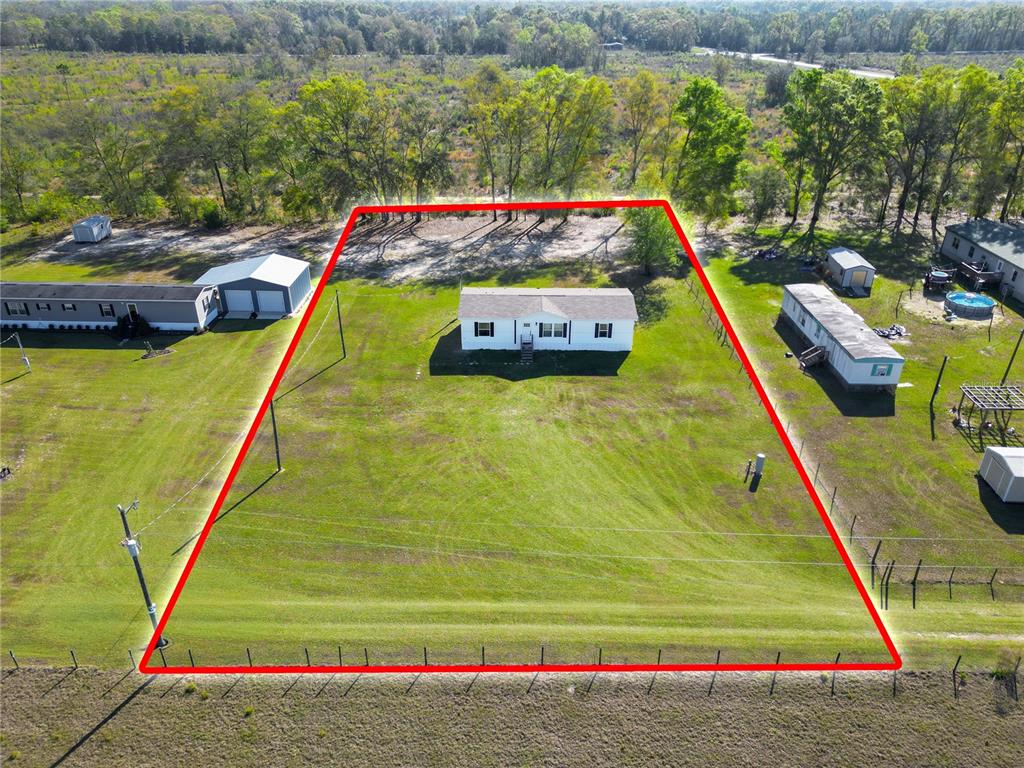 5570 Northeast 76th Avenue High Springs, FL 32643 - Photo 22 of 31 a view of swimming pool with seating area