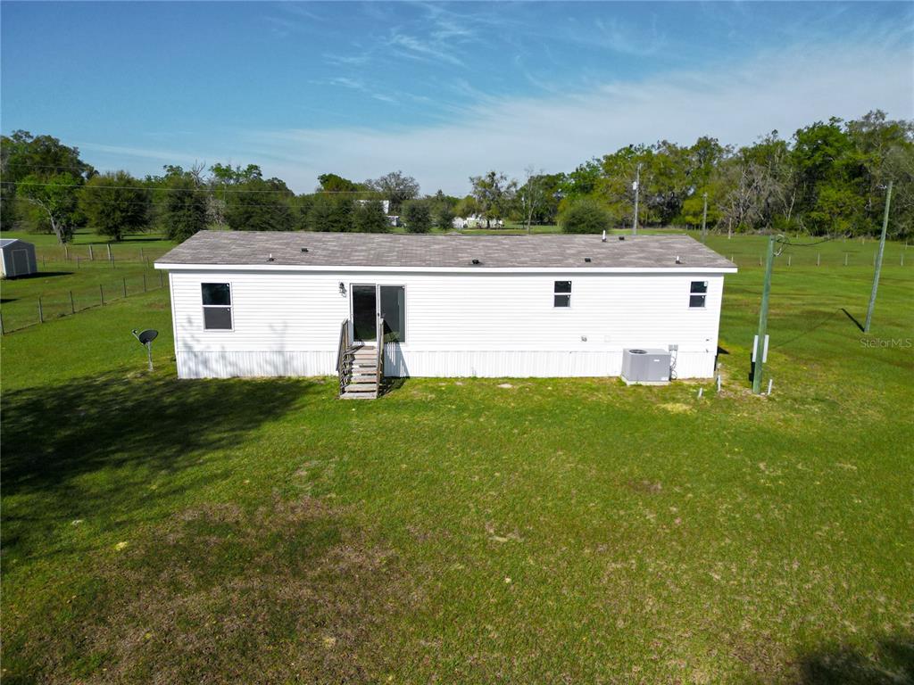 5570 Northeast 76th Avenue High Springs, FL 32643 - Photo 28 of 31 a view of a backyard