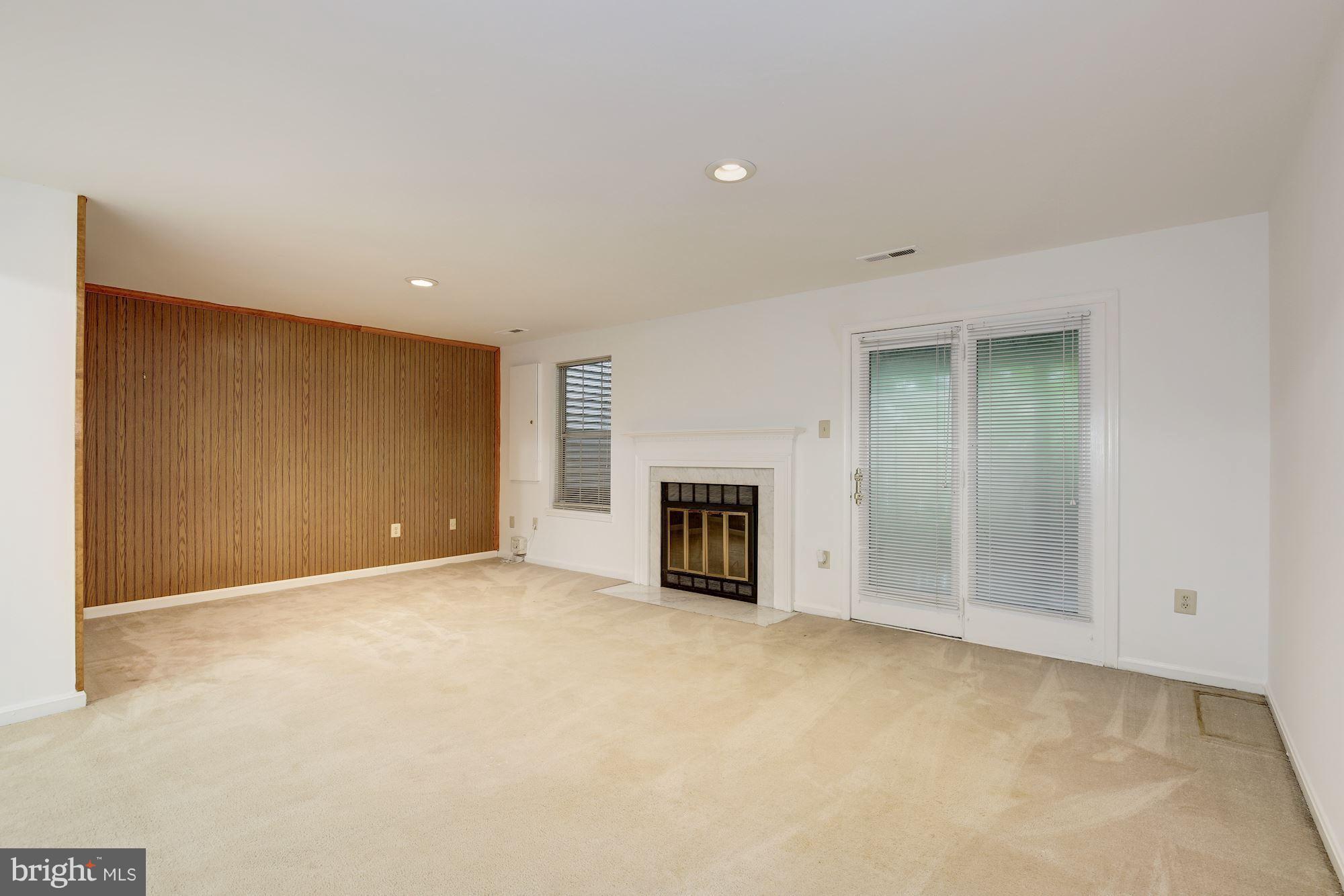 15033 Shamrock Ridge Road Silver Spring, MD 20906 - Photo 22 of 27 Family room with fireplace