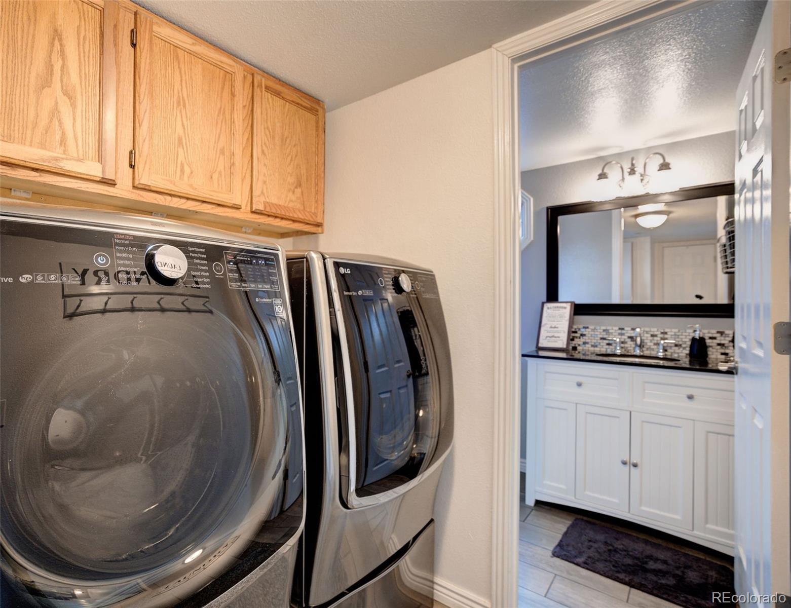 612 Ruby Drive Fort Collins, CO 80525 - Photo 14 of 40 a view of washer and dryer