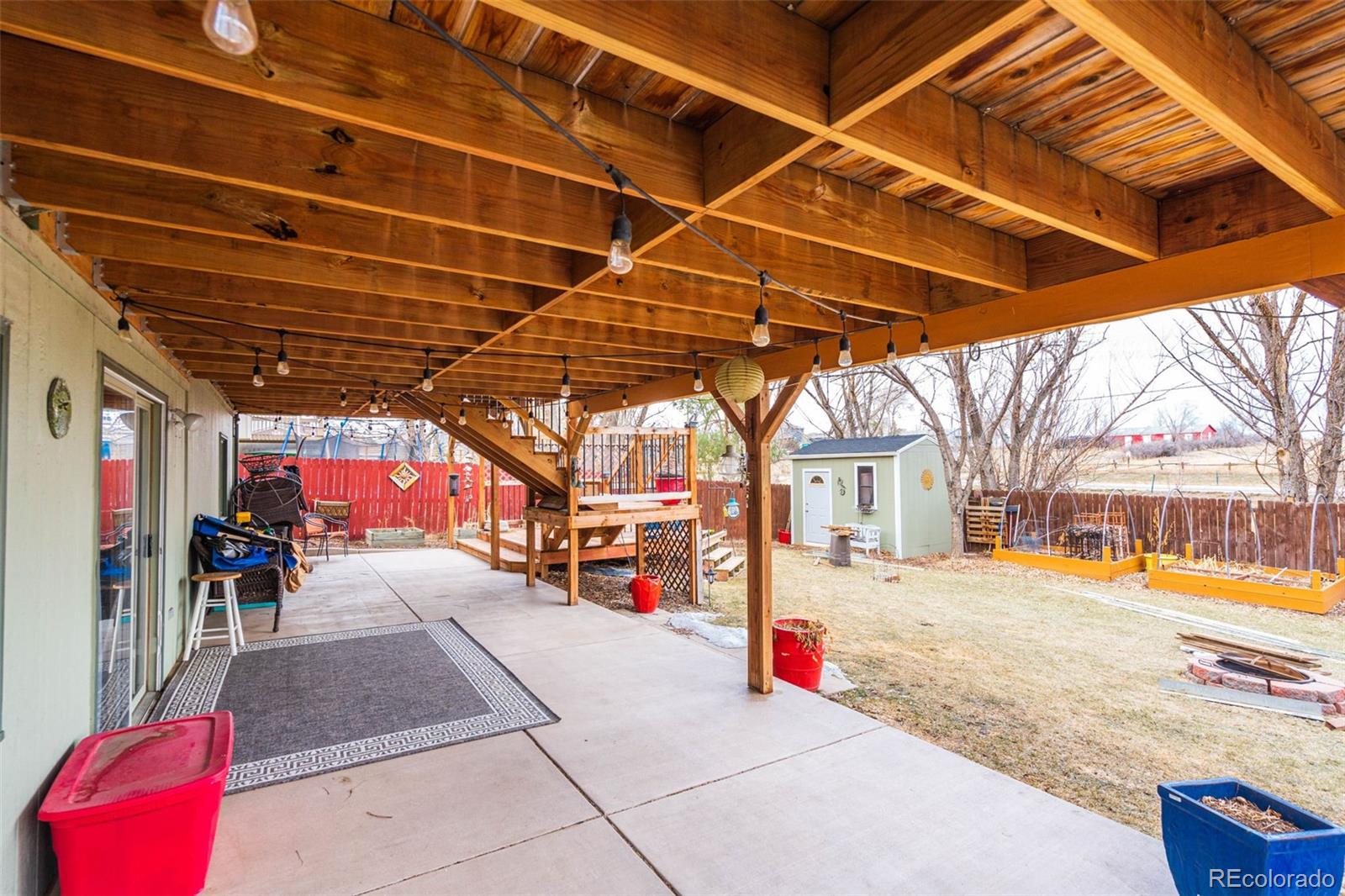 612 Ruby Drive Fort Collins, CO 80525 - Photo 36 of 40 a view of a backyard with a patio