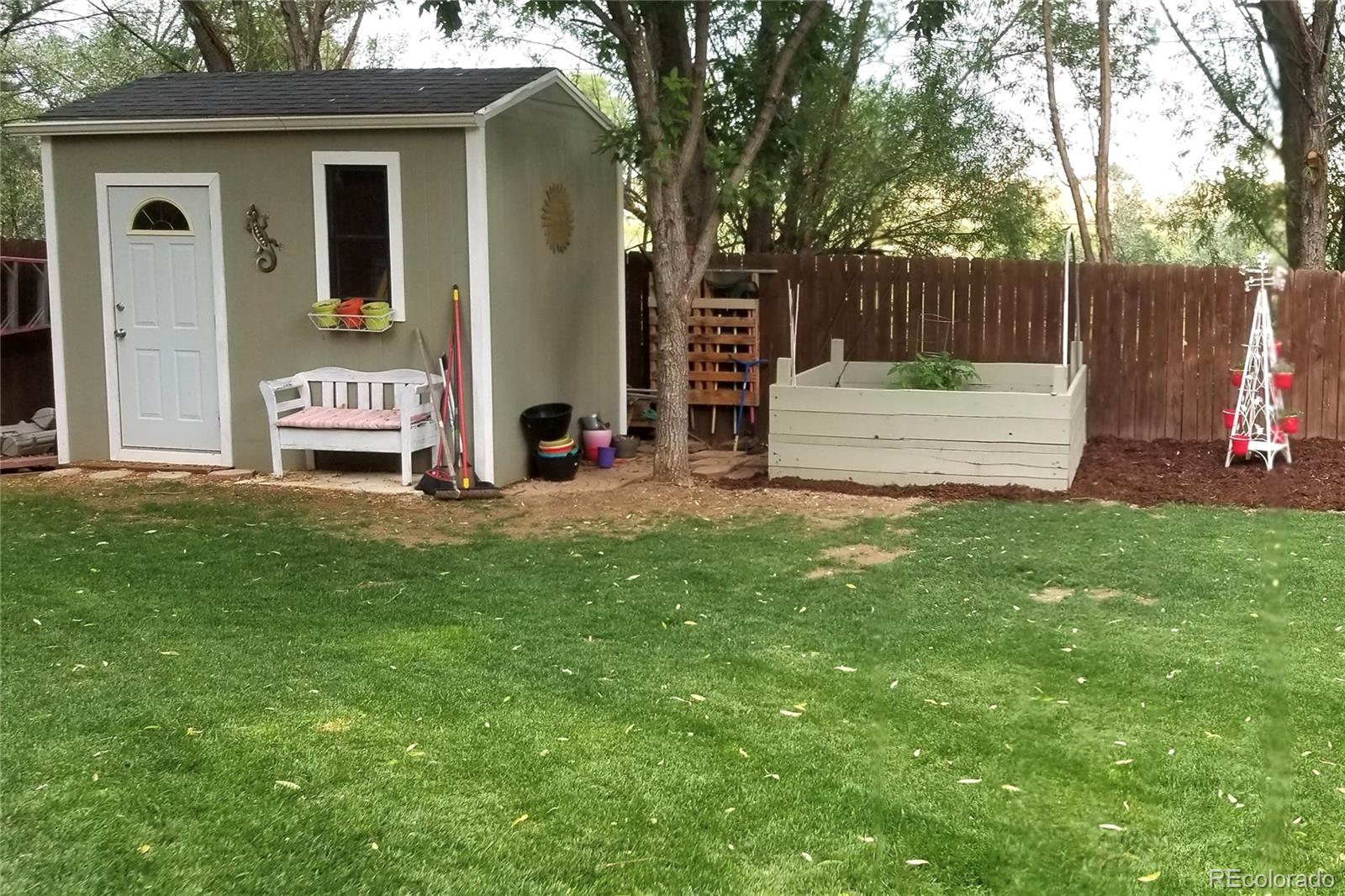 612 Ruby Drive Fort Collins, CO 80525 - Photo 38 of 40 a view of front door with yard