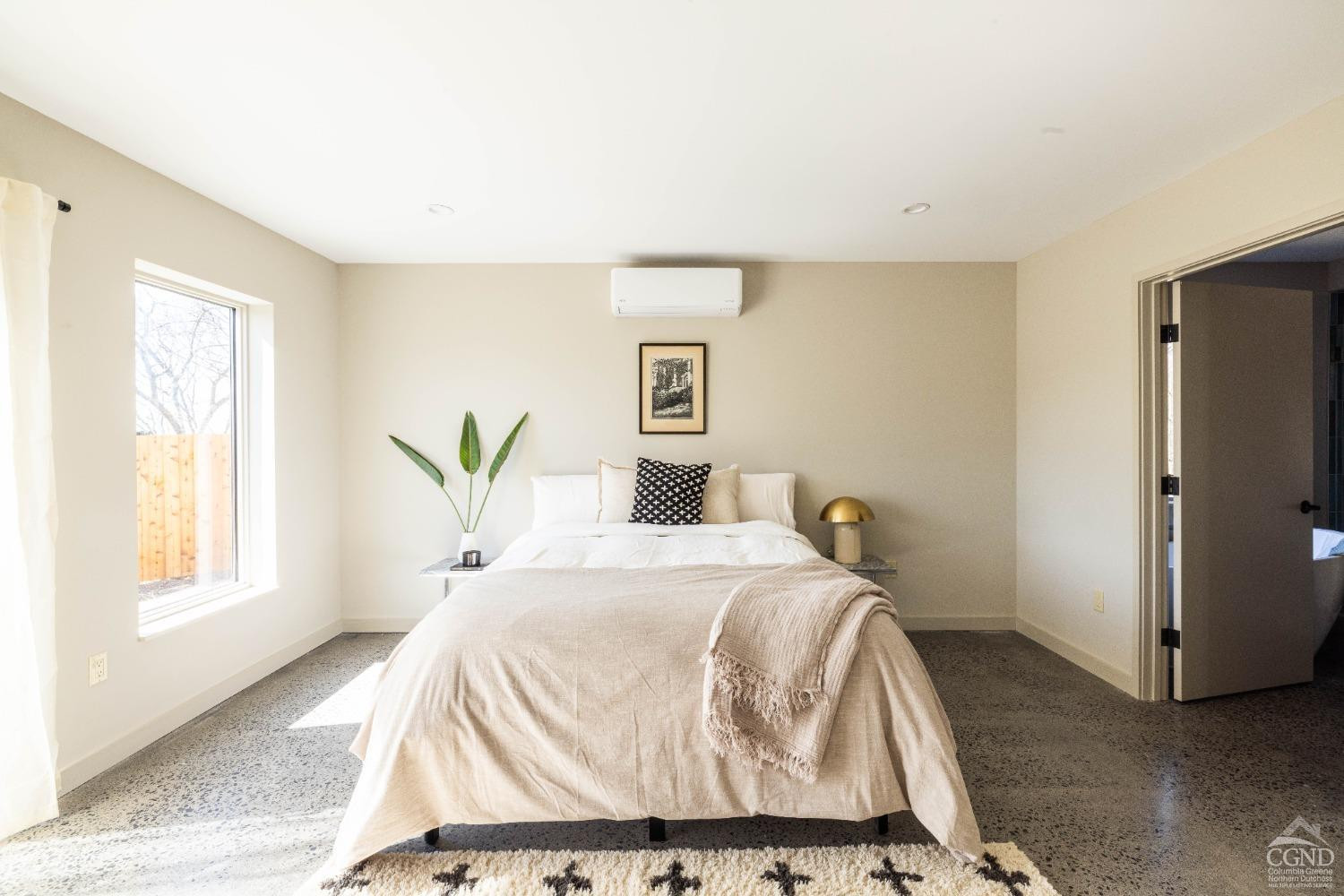 998 Willow Brook Road Milan, NY 12514 - Photo 13 of 34 a bedroom with a bed and wooden floor