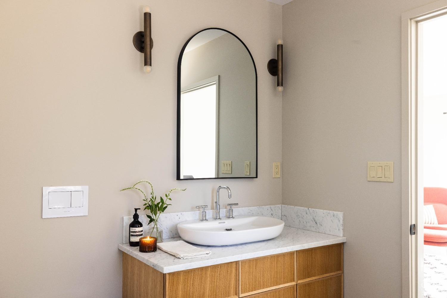 998 Willow Brook Road Milan, NY 12514 - Photo 17 of 34 a bathroom with a sink and a mirror