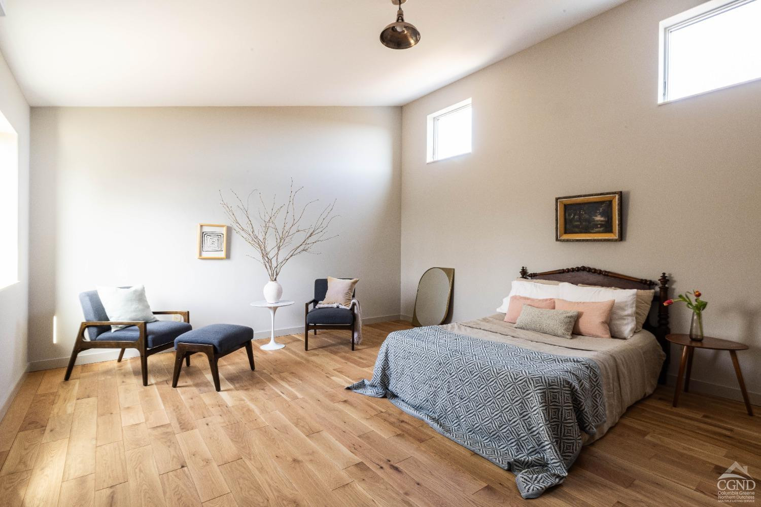 998 Willow Brook Road Milan, NY 12514 - Photo 22 of 34 a bedroom with a bed and wooden floor