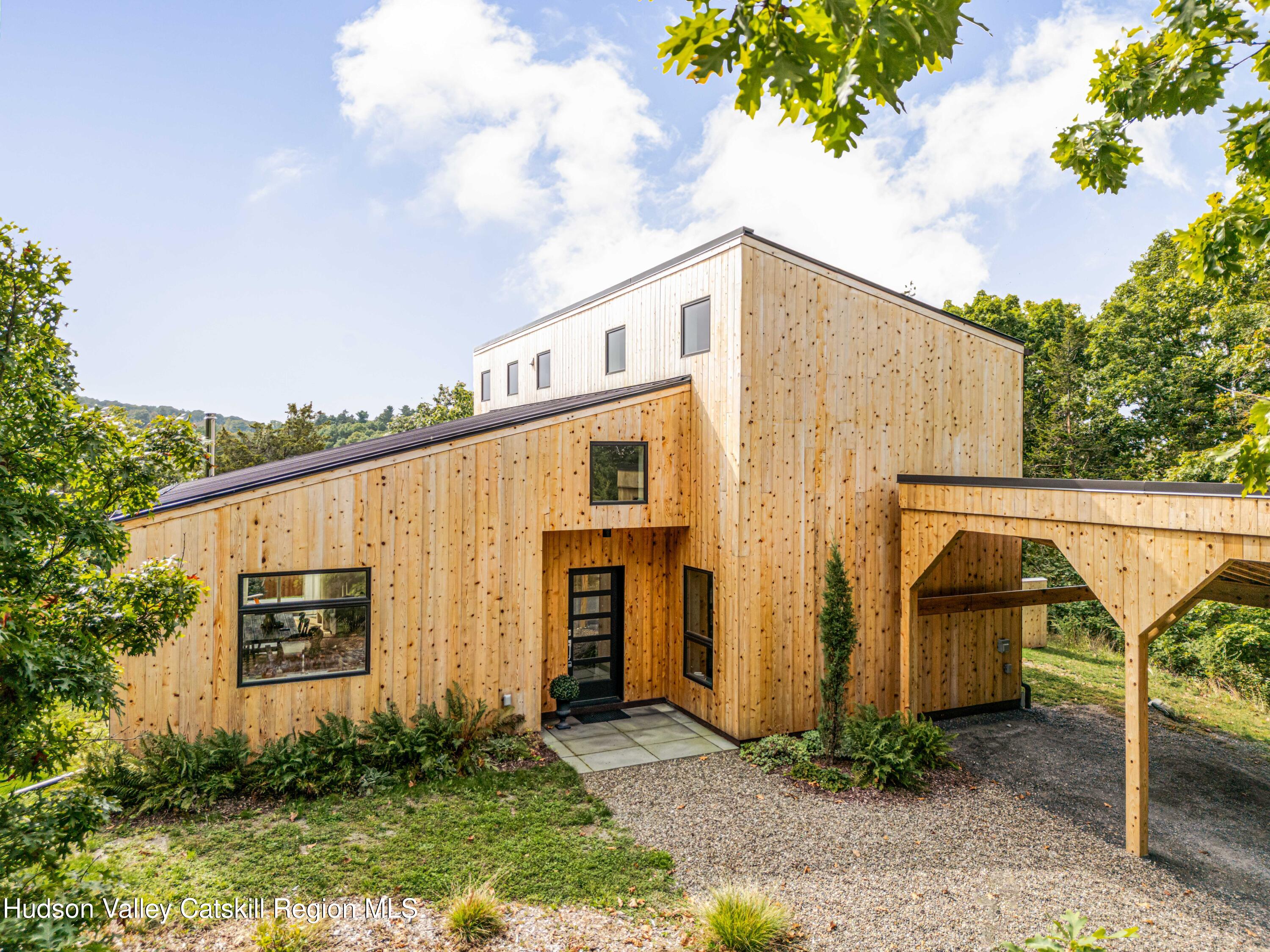 998 Willow Brook Road Milan, NY 12514 - Photo 3 of 34 a view of a house with backyard and garden