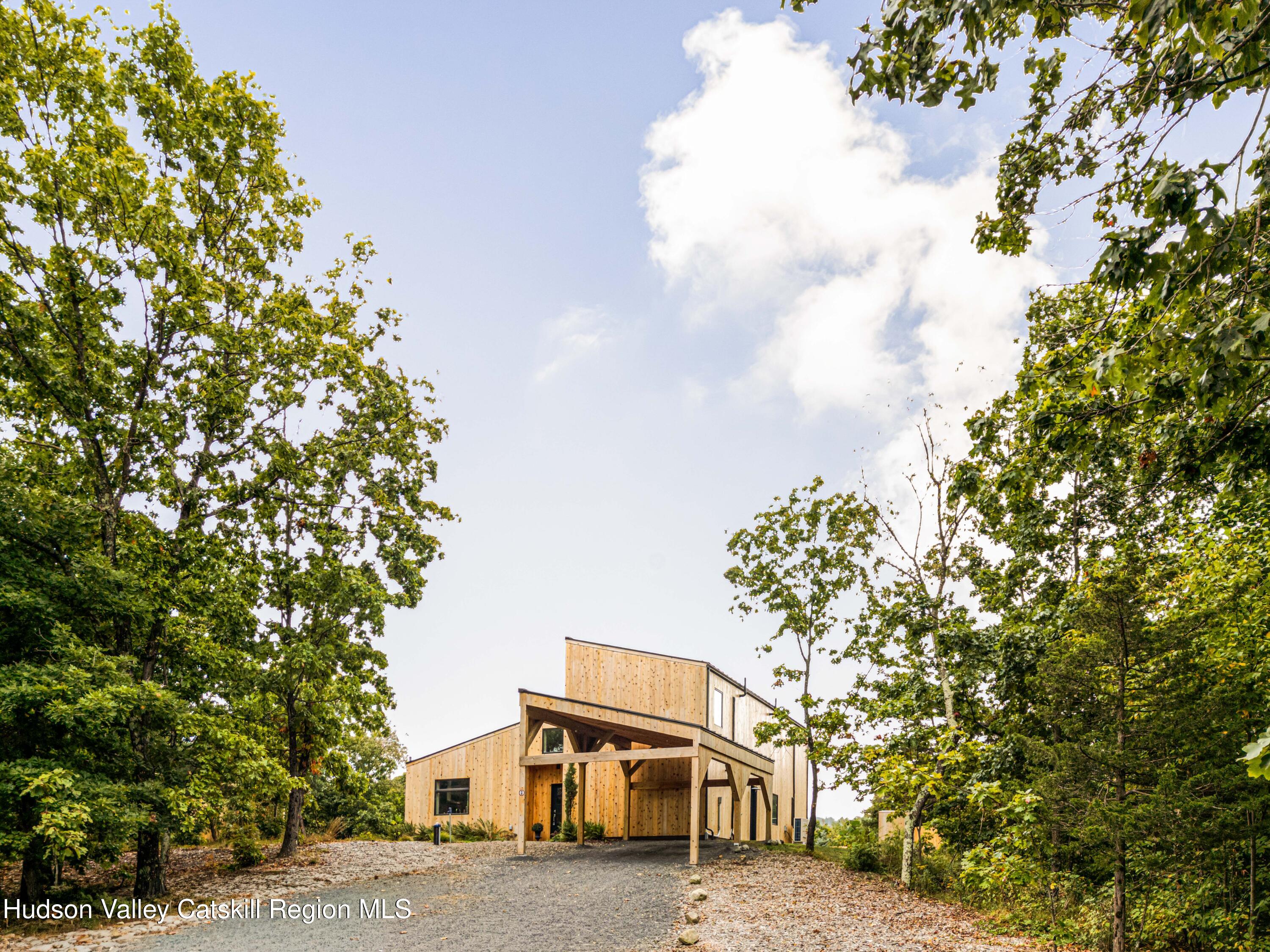 998 Willow Brook Road Milan, NY 12514 - Photo 6 of 34 a house with a tree in front of it
