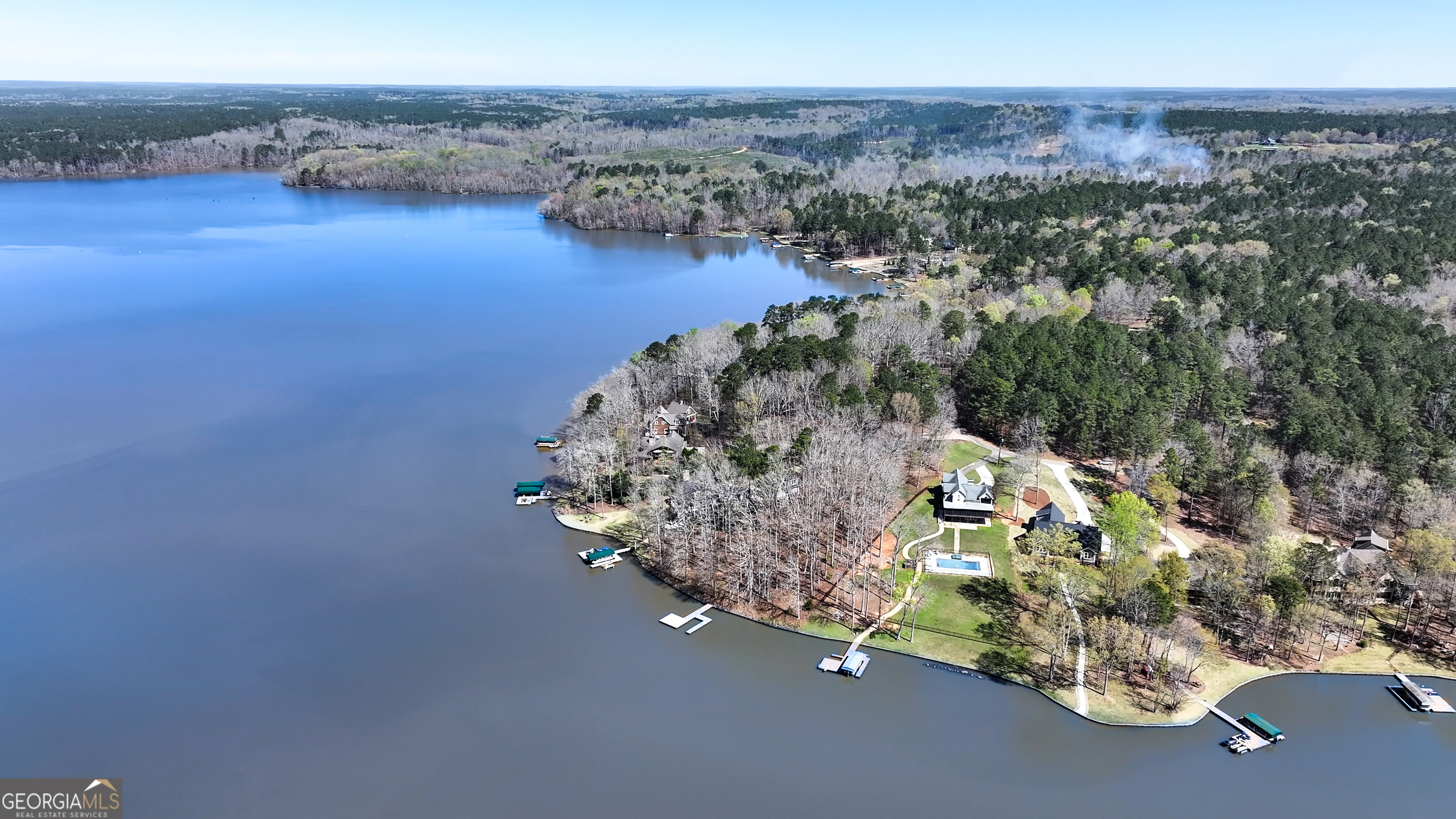 1921 Withrow Road Greensboro, GA 30642 - Photo 13 of 15 an aerial view of a house with a yard and lake view