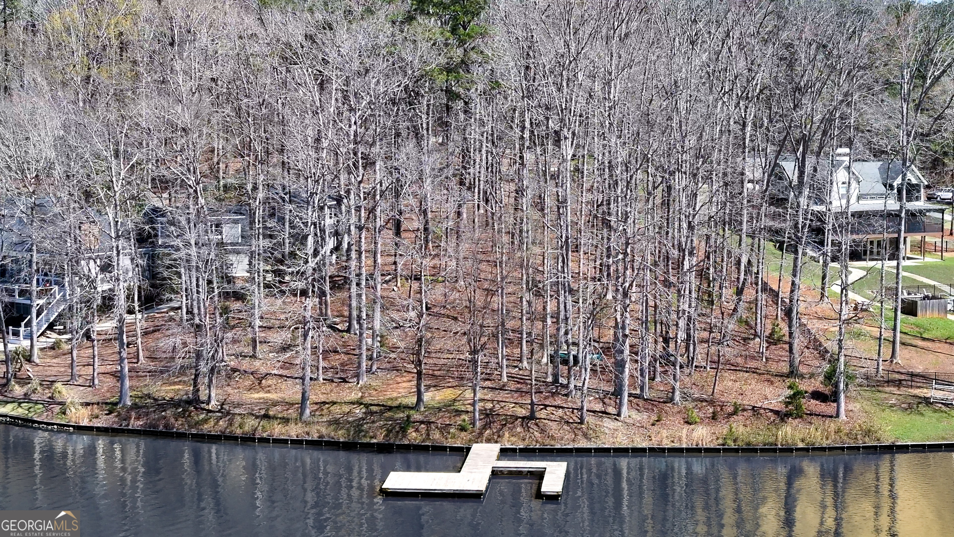 1921 Withrow Road Greensboro, GA 30642 - Photo 5 of 15 a view of swimming pool with outdoor seating