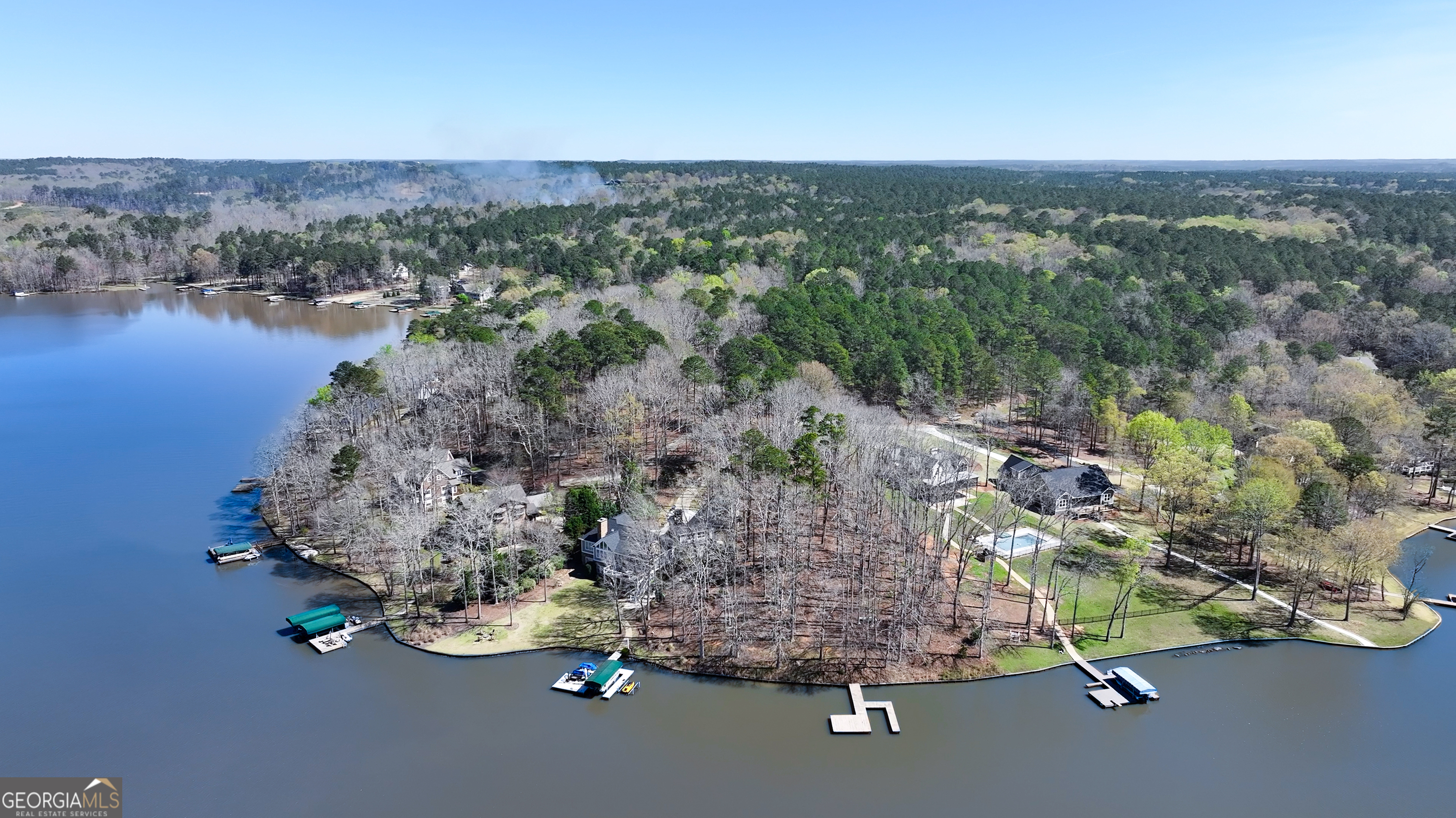 1921 Withrow Road Greensboro, GA 30642 - Photo 7 of 15 an aerial view of a house with a yard and lake view