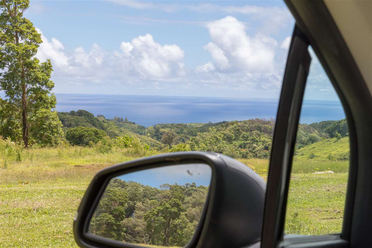 549 Burns Road Haiku, HI 96708 - Photo 2 of 22 a view of a lake from a window