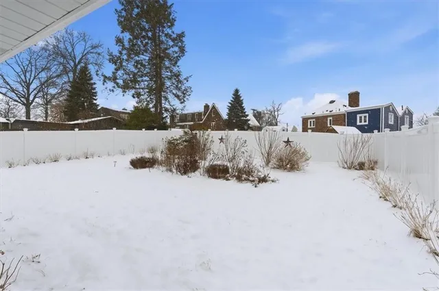 a view of swimming pool with a yard