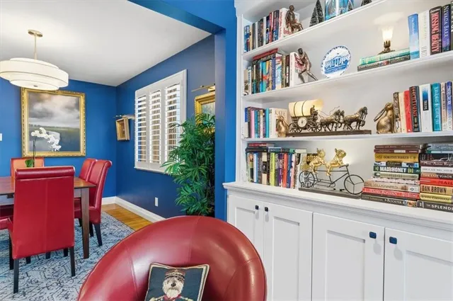 a workspace with furniture and book shelf