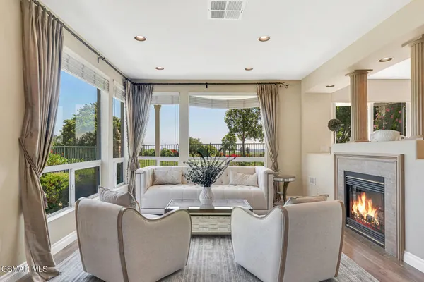 a bathroom with a double vanity sink toilet and shower