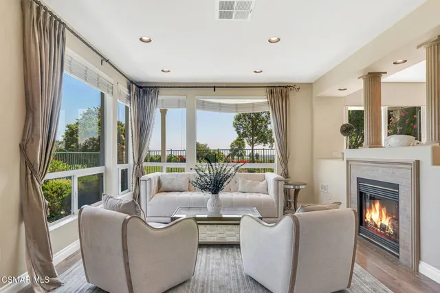 a bathroom with a double vanity sink toilet and shower