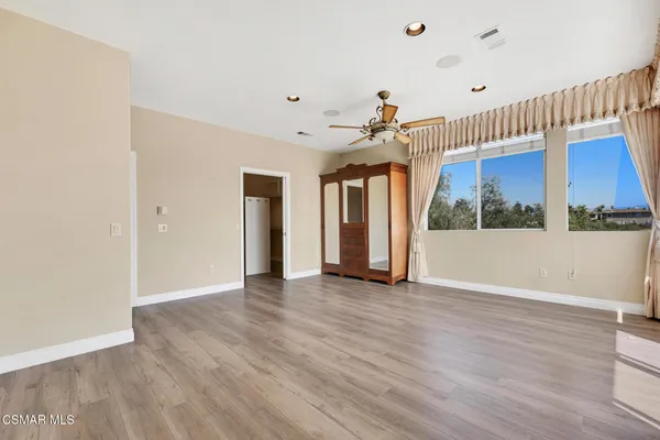 a view of a balcony with an outdoor space