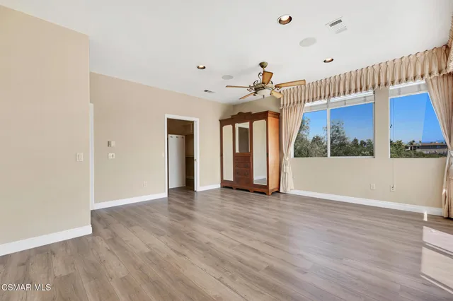 a view of a balcony with an outdoor space