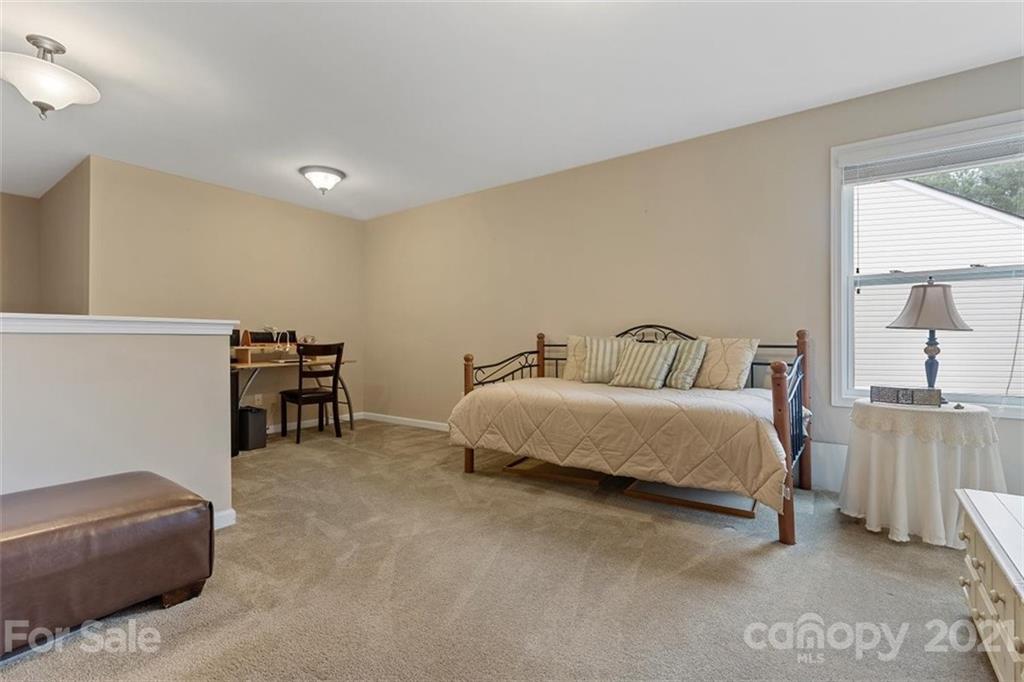 78150 Rillstone Drive Lancaster, SC 29720 - Photo 22 of 41 a bedroom with a bed and a cabinets