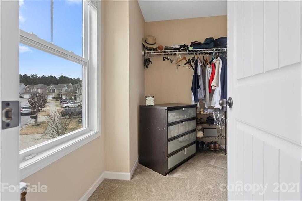 78150 Rillstone Drive Lancaster, SC 29720 - Photo 24 of 41 a view of walk in closet with clothes and shoes