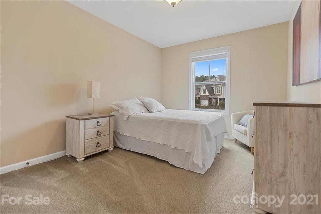 78150 Rillstone Drive Lancaster, SC 29720 - Photo 25 of 41 a bedroom with a bed and a window