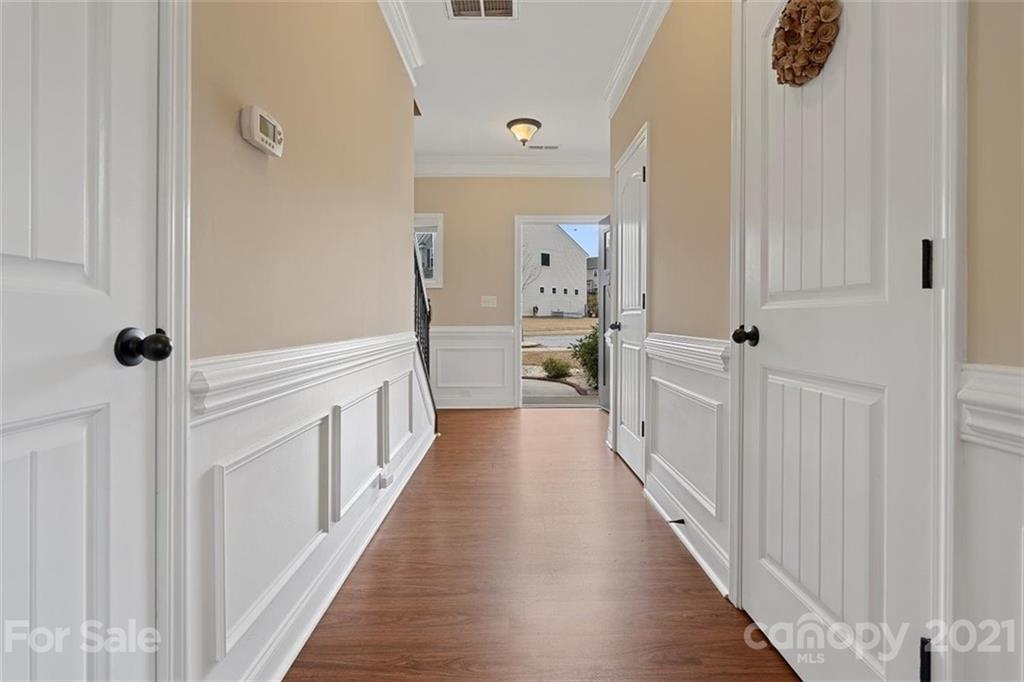 78150 Rillstone Drive Lancaster, SC 29720 - Photo 5 of 41 a view of a hallway with wooden floor and staircase