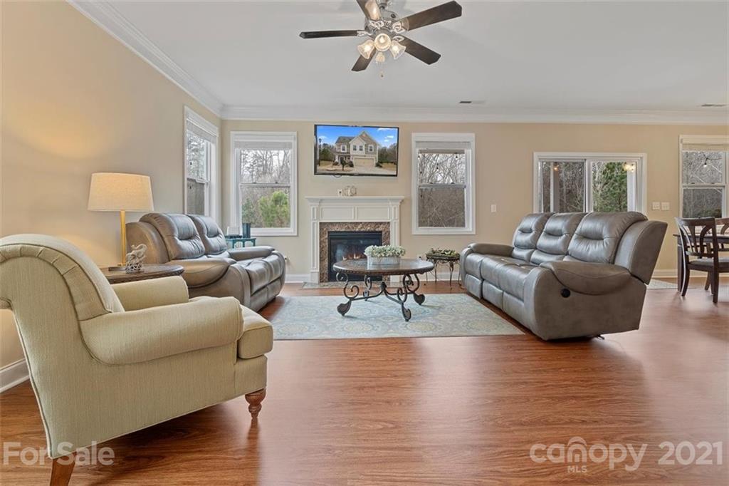 78150 Rillstone Drive Lancaster, SC 29720 - Photo 7 of 41 a living room with furniture and a fireplace