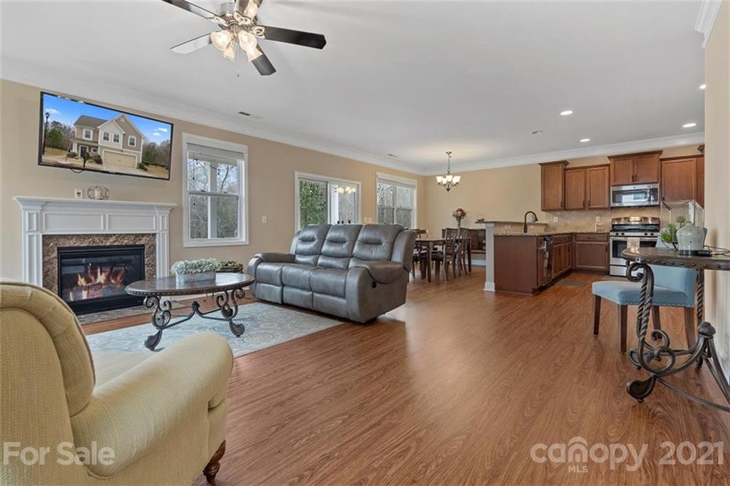 78150 Rillstone Drive Lancaster, SC 29720 - Photo 8 of 41 a living room with furniture and a fireplace
