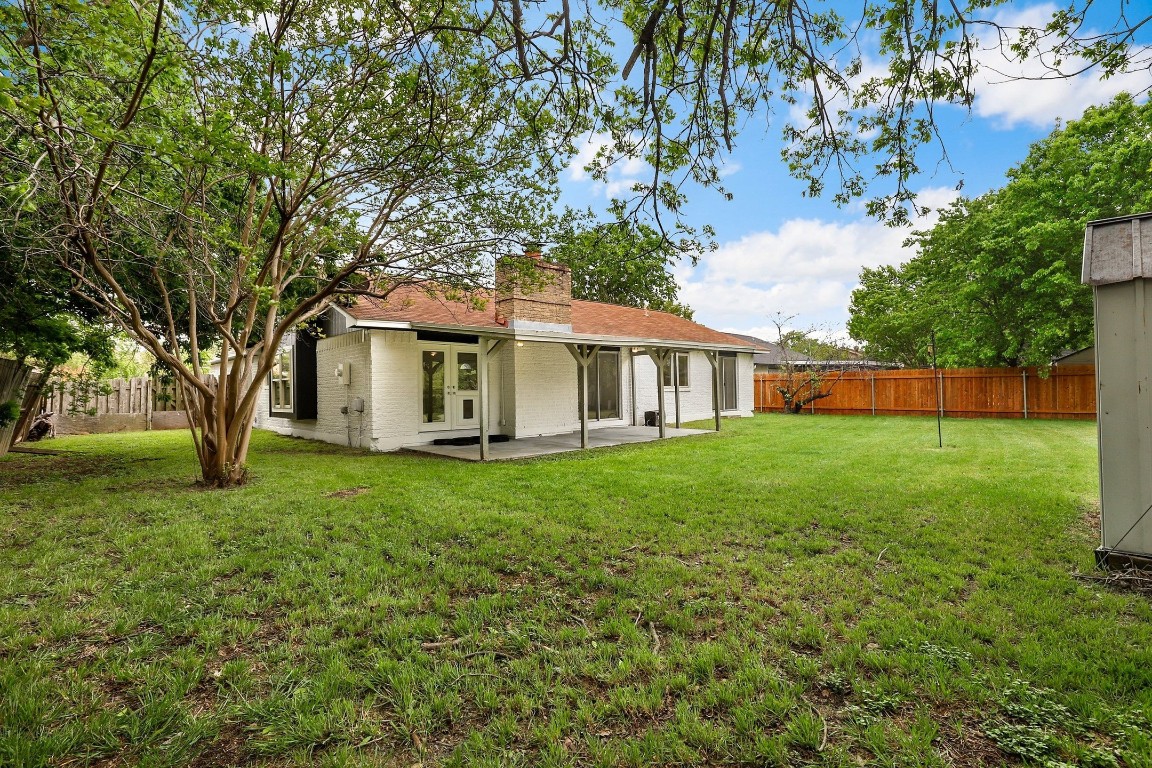 1008 Ridgeline Drive Round Rock, TX 78664 - Photo 29 of 30 a view of an house with backyard and a tree