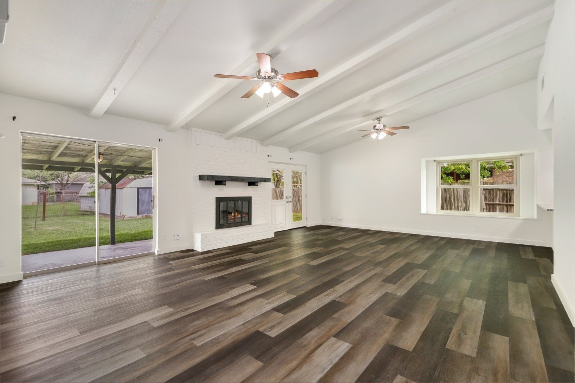 1008 Ridgeline Drive Round Rock, TX 78664 - Photo 4 of 30 a view of empty room with wooden floor and fan