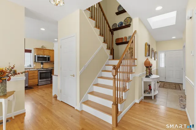 a view of a living room and wooden floor