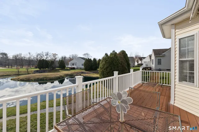 a view of balcony with furniture