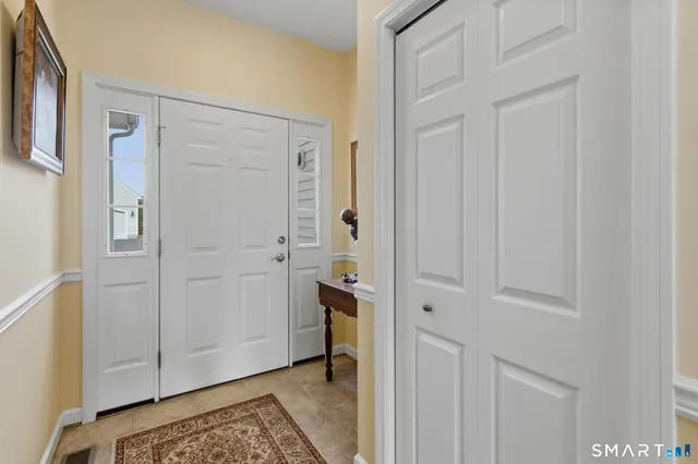 a view of walk in closet with livingroom view