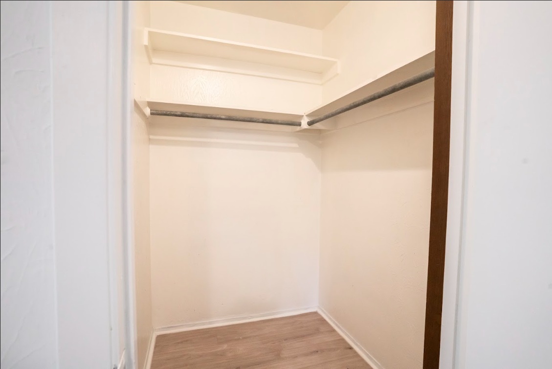 906 Silver Quail Lane Austin, TX 78758 - Photo 21 of 33 Spacious closet featuring light wood finished floors