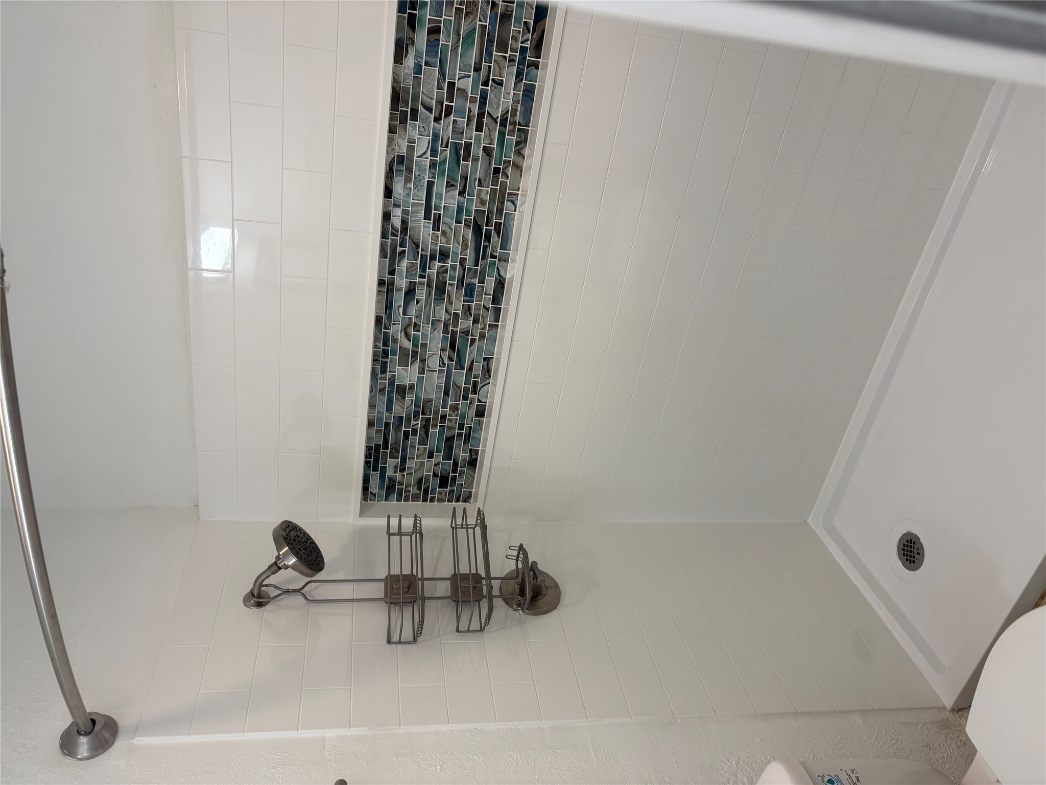 906 Silver Quail Lane Austin, TX 78758 - Photo 25 of 33 Bathroom with a shower stall and toilet