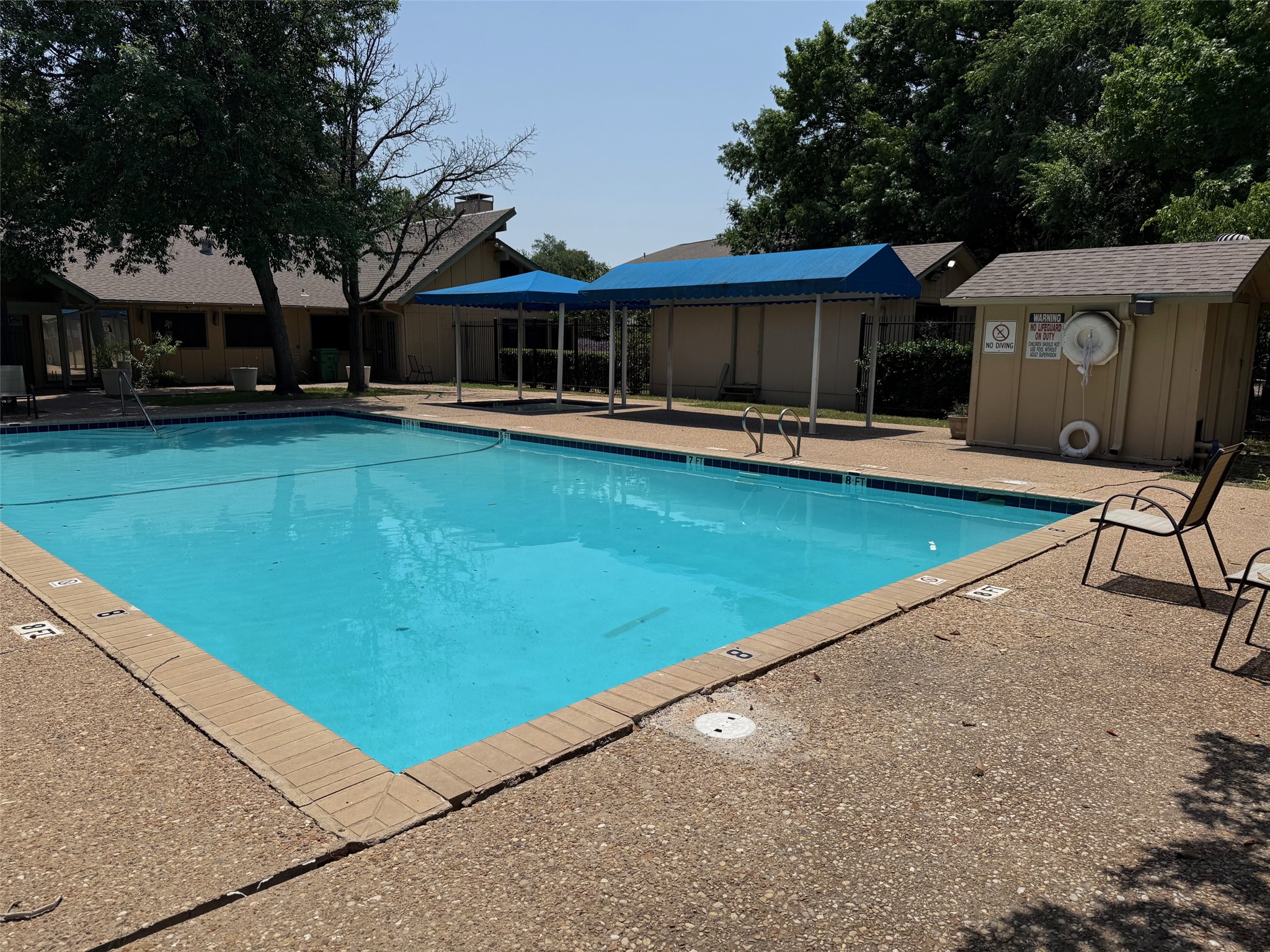 906 Silver Quail Lane Austin, TX 78758 - Photo 31 of 33 Community pool featuring a patio