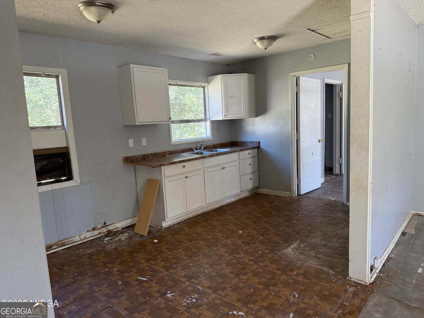 3480 Travis Boulevard Macon, GA 31206 - Photo 16 of 19 a kitchen with stainless steel appliances granite countertop a stove a sink and a refrigerator
