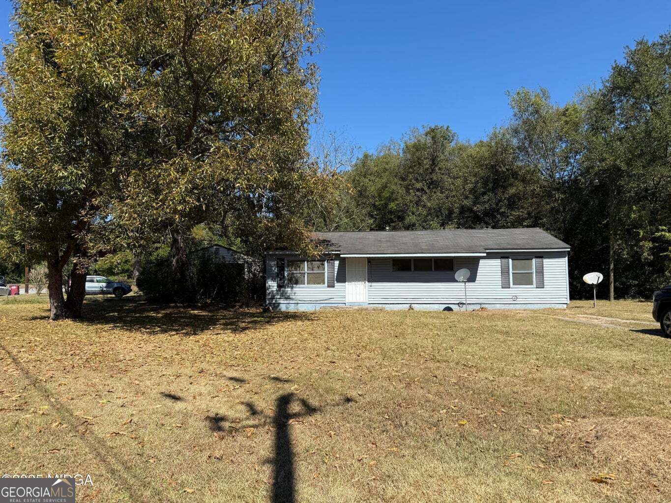3480 Travis Boulevard Macon, GA 31206 - Photo 3 of 19 a front view of a house with a yard covered with snow