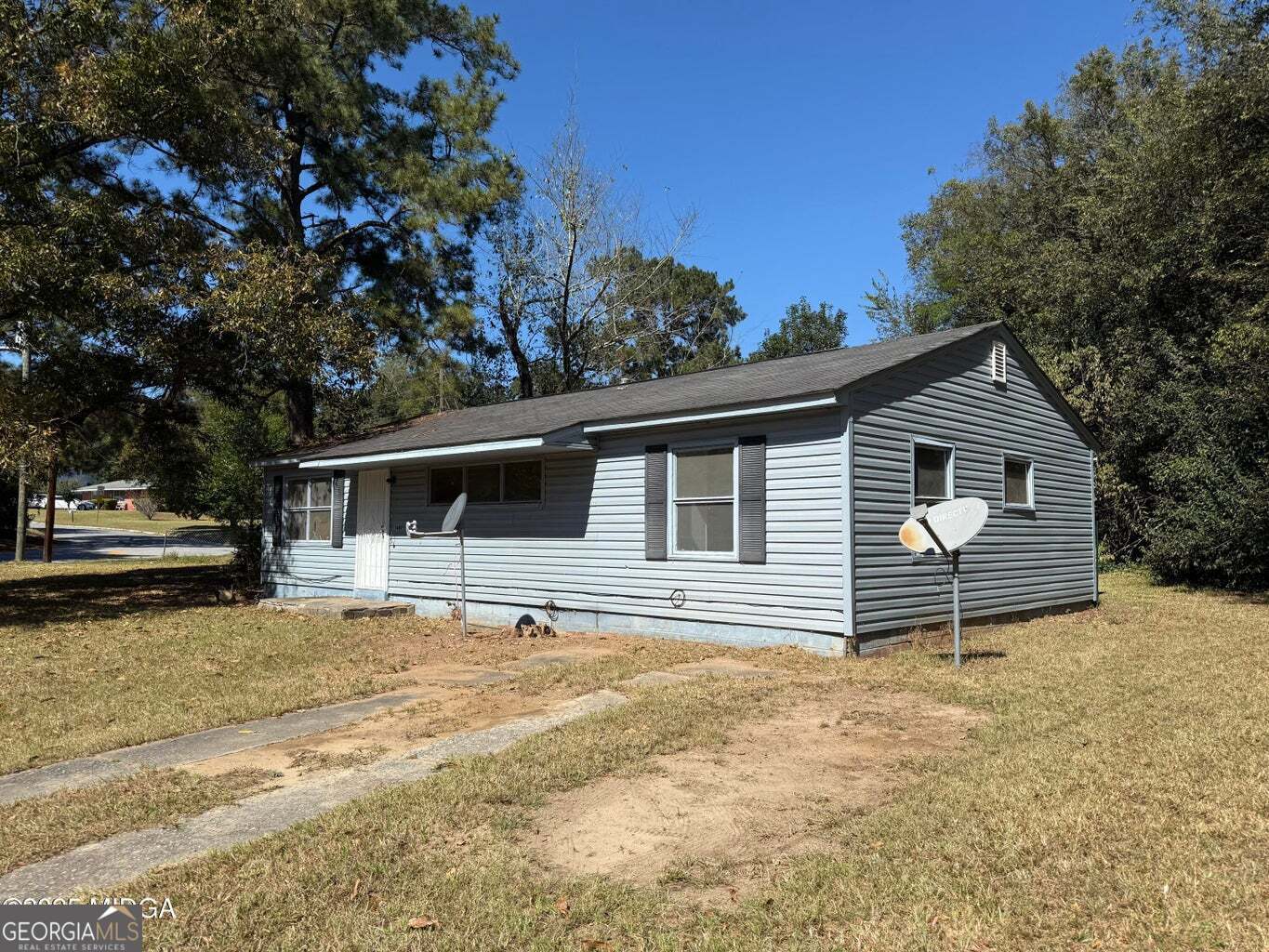 3480 Travis Boulevard Macon, GA 31206 - Photo 5 of 19 a house that has a tree in front of a house