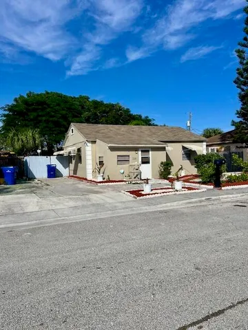 a view of the house with a patio