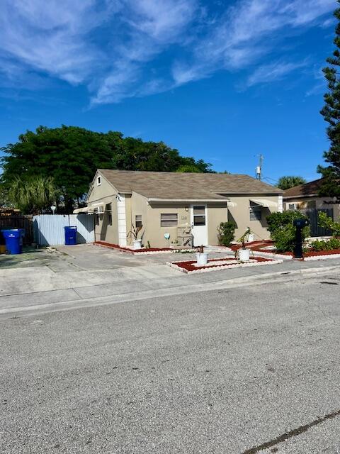 a view of the house with a patio