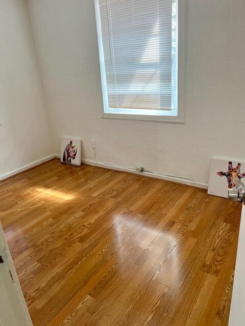 538 West 3rd Street Riviera Beach, FL 33404 - Photo 8 of 10 a view of a room with wooden floor and a window