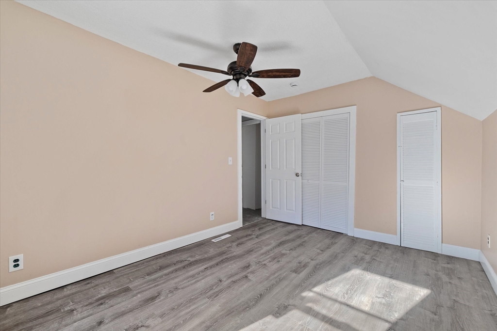 17 Otis Street Warren, MA 01083 - Photo 18 of 26 a view of empty room with wooden floor
