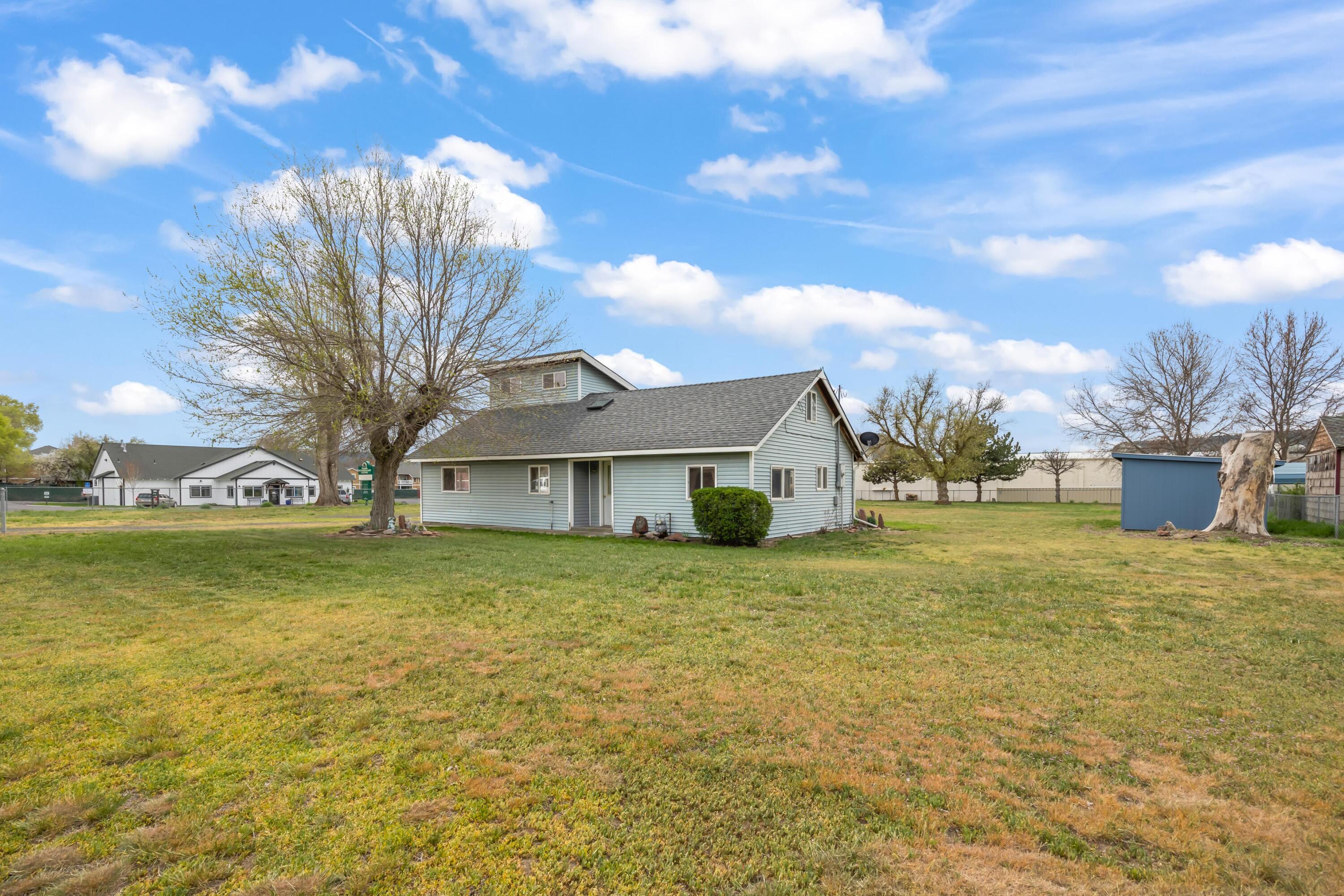 2010 Northeast Laughlin Road Prineville, OR 97754 - Photo 24 of 39 a view of a house with a yard