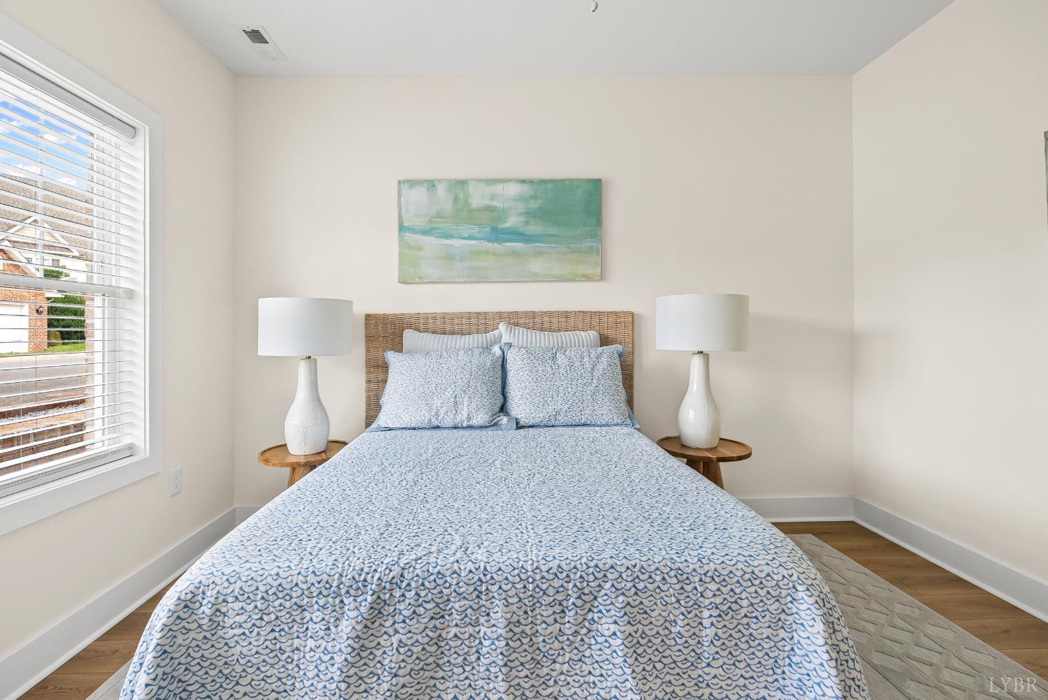 420 Capstone Drive, Unit 205 Lynchburg, VA 24502 - Photo 28 of 47 a bed room with a bed and a night stand