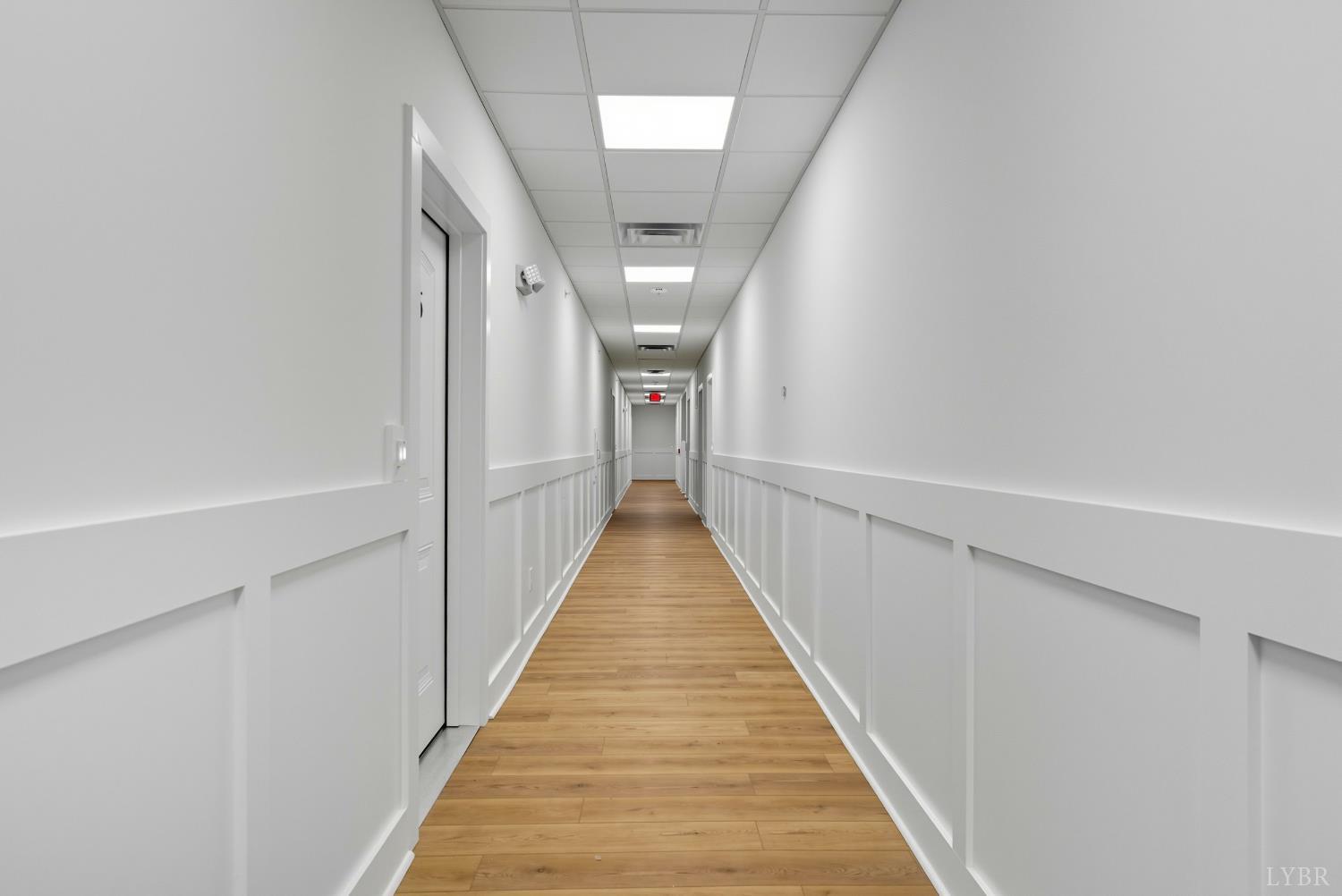 420 Capstone Drive, Unit 205 Lynchburg, VA 24502 - Photo 36 of 47 a view of a hallway with wooden floor