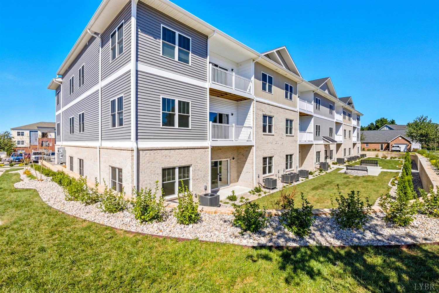 420 Capstone Drive, Unit 205 Lynchburg, VA 24502 - Photo 42 of 47 a view of a building with a garden
