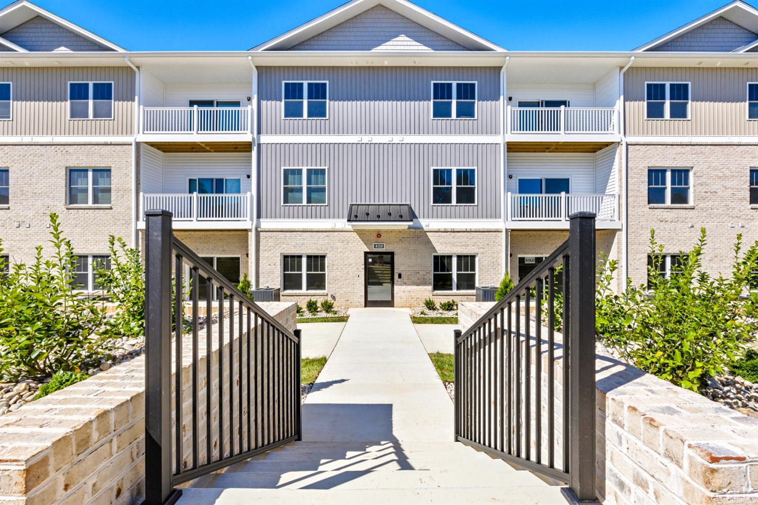420 Capstone Drive, Unit 205 Lynchburg, VA 24502 - Photo 43 of 47 a front view of a house with a yard