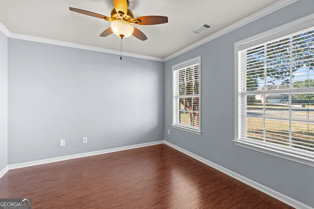 a view of entryway with wooden floor