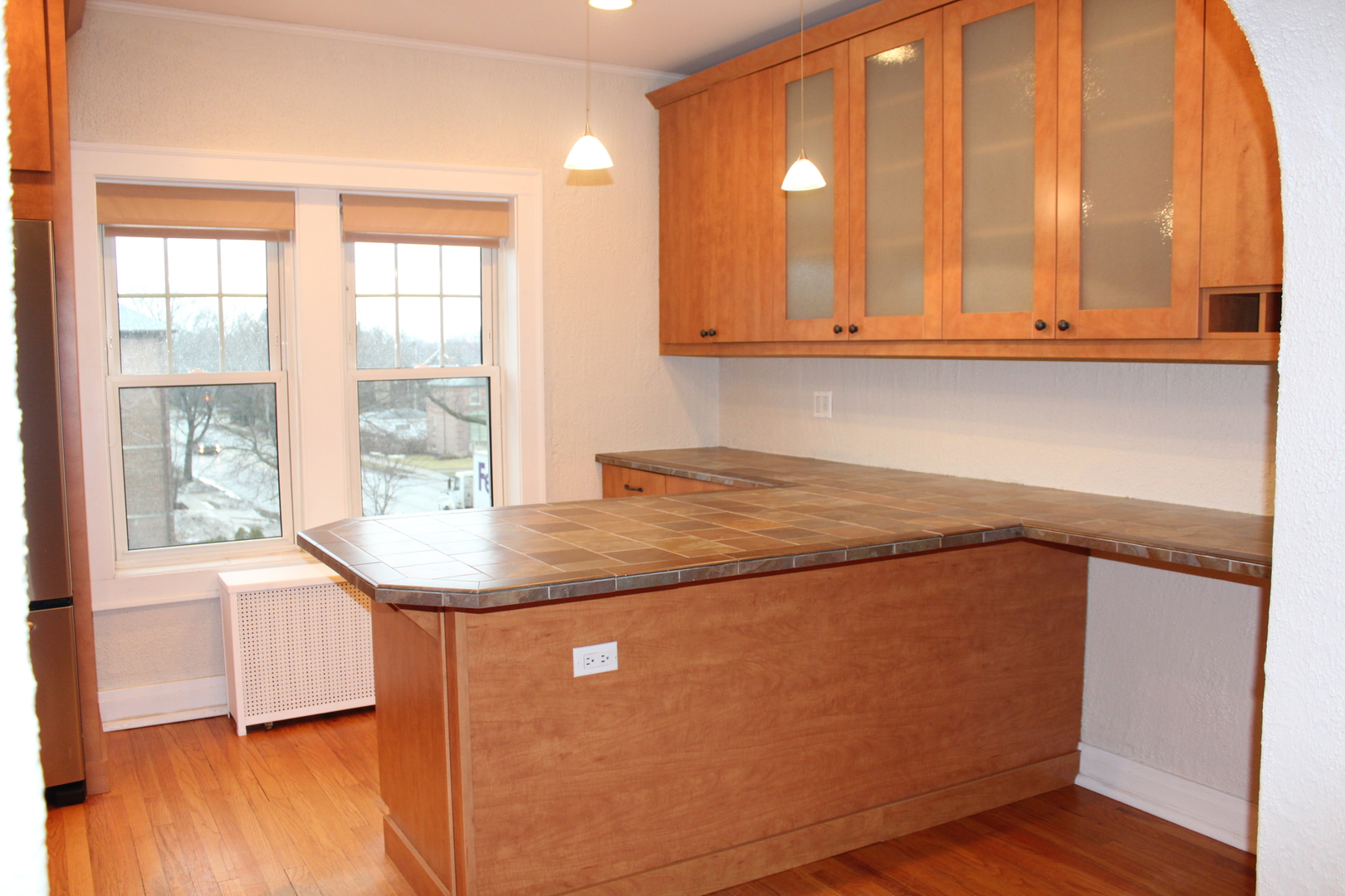 2 South Lincoln Avenue, Unit 3A Park Ridge, IL 60068 - Photo 11 of 26 a kitchen with stainless steel appliances granite countertop a sink and a cabinets