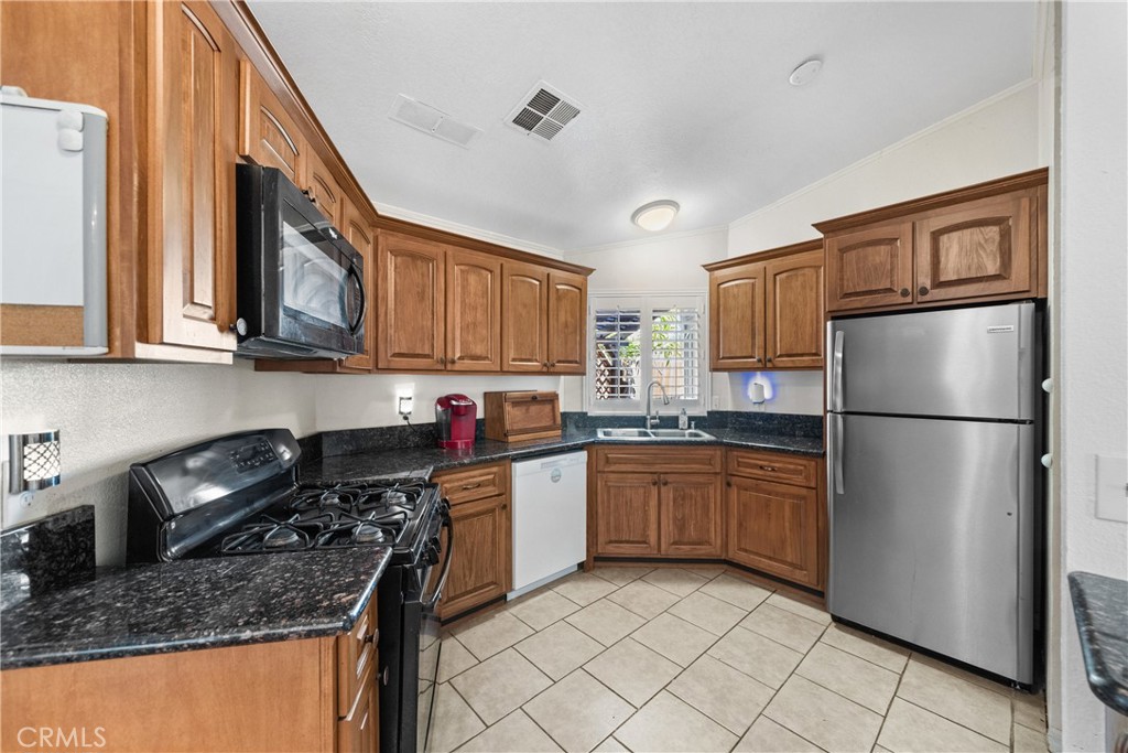 24553 Maitri Road Temescal Valley, CA 92883 - Photo 16 of 36 Updated cabinets